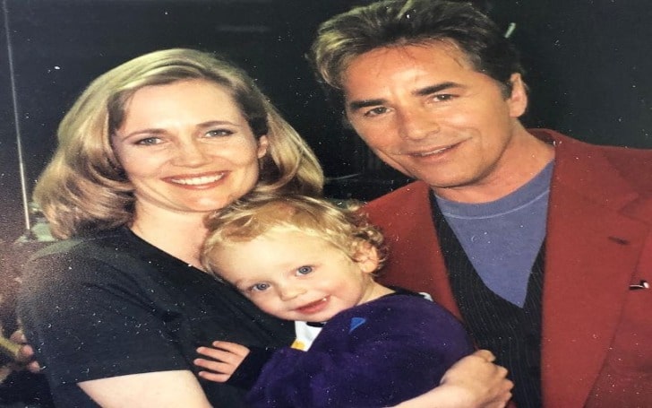 Geraldine Leer in a black t-shirt with her ex-husband in red coat and son in dark blue sweater.